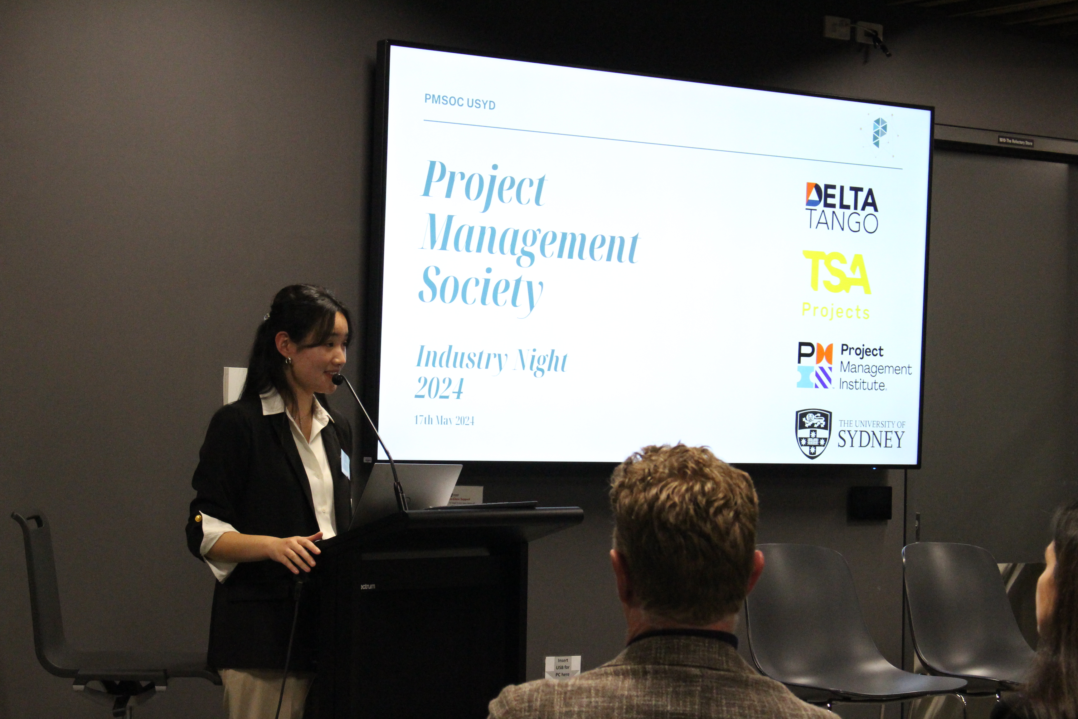 Delta Tango Advisory consultant briefing USYD PMSOC students inside the Great Hall